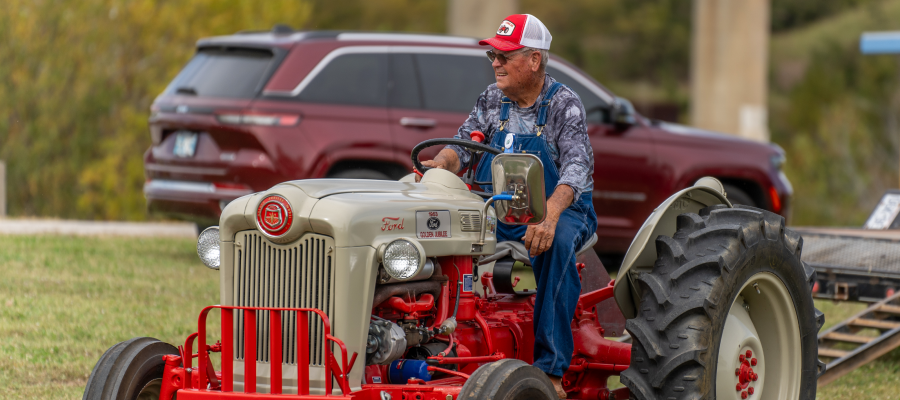 man on tractor
